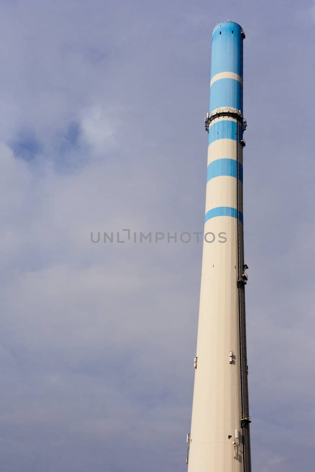 High concrete industrial chimney by PiLens