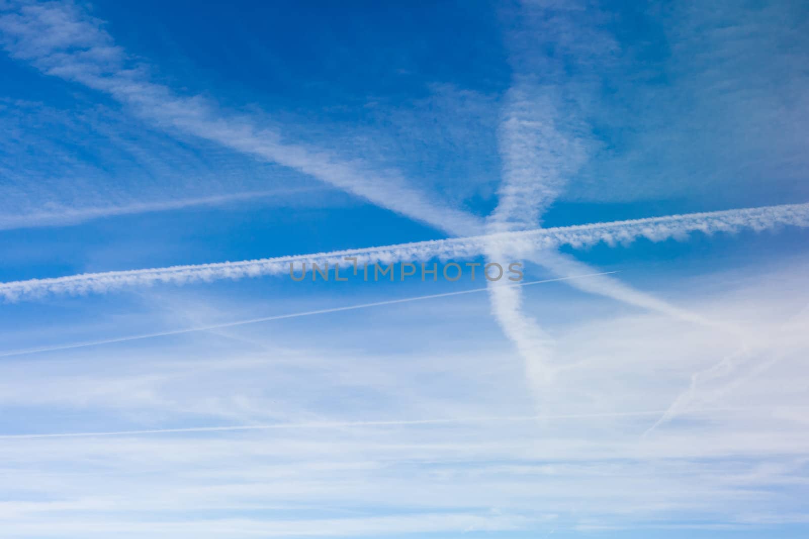 Lots of Aircraft Vapor Trails in the Sky. by PiLens