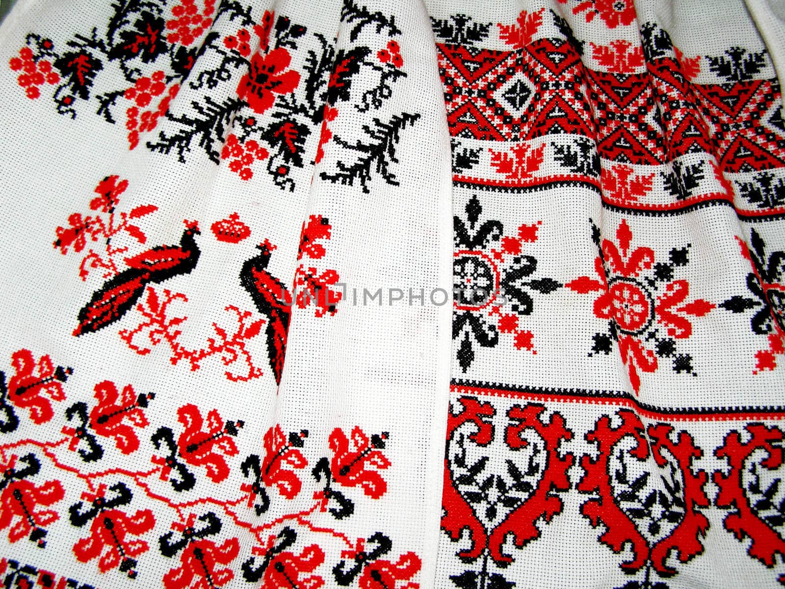 Ukrainian embroidery by small cross is the national property. 