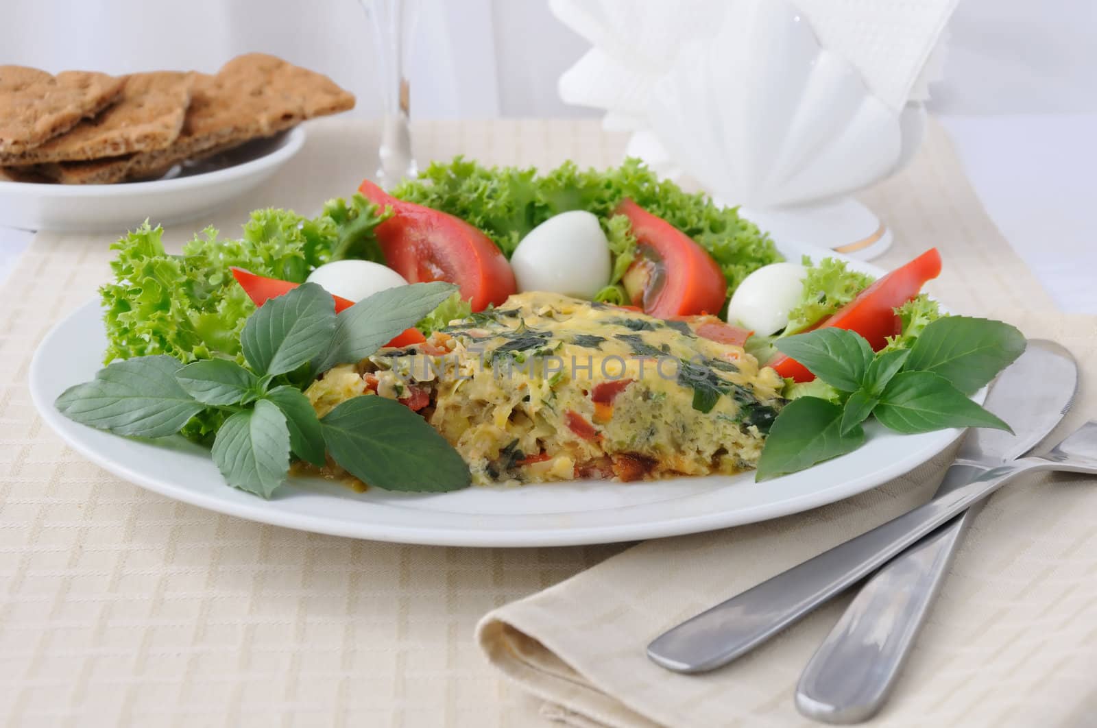 Fried zucchini and basil with vegetables and salad leaves