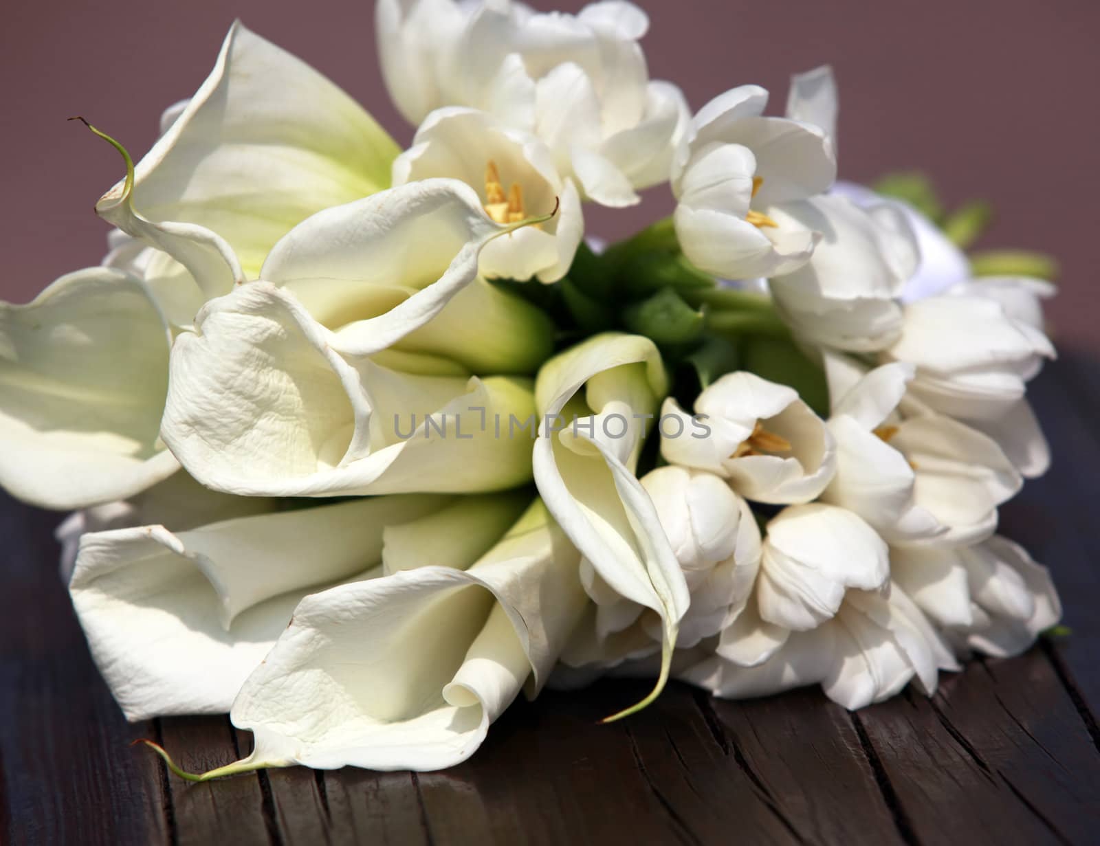 Wedding bouquet from tulips and callas