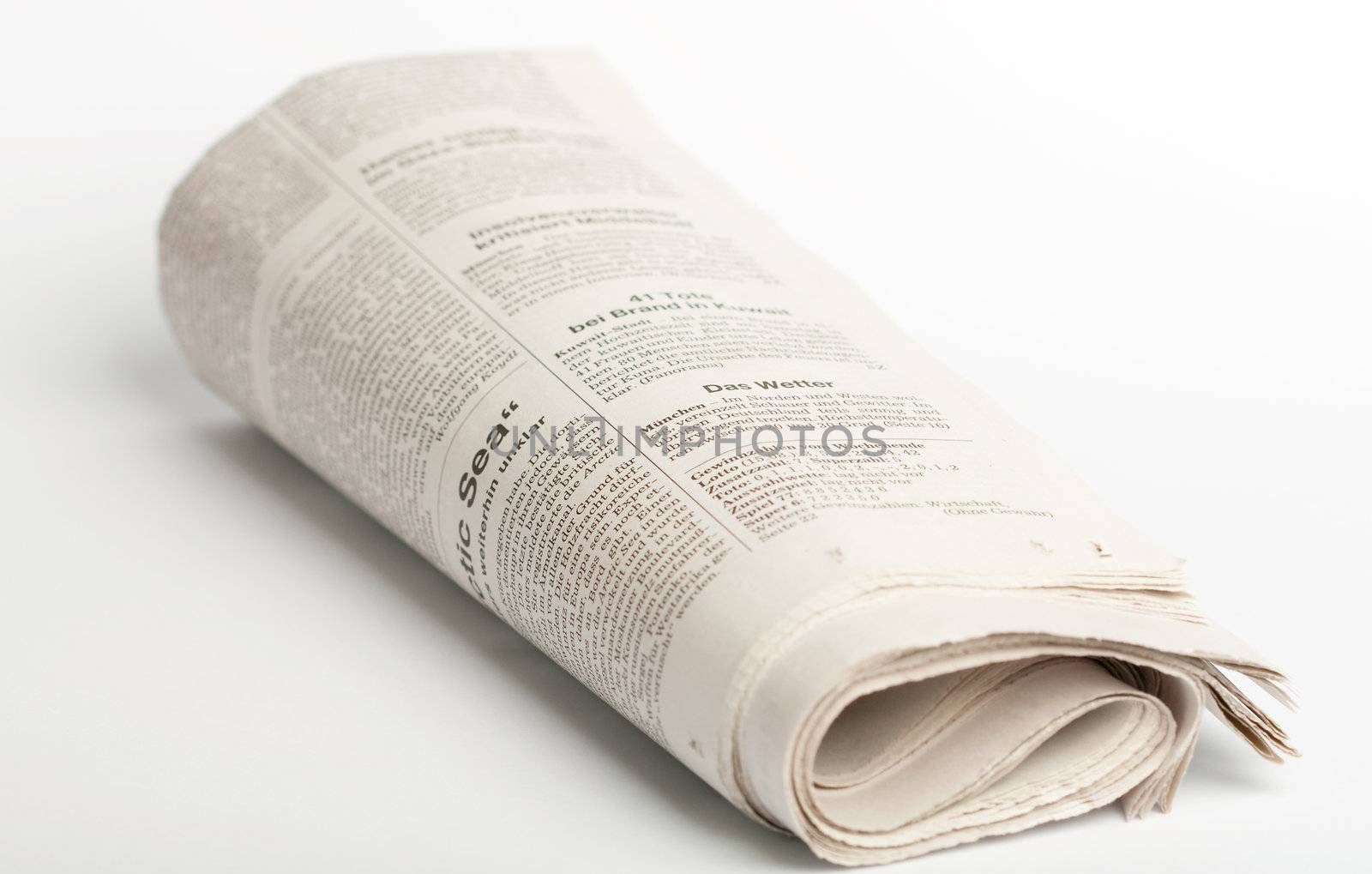 A german newspaper isolated on white background