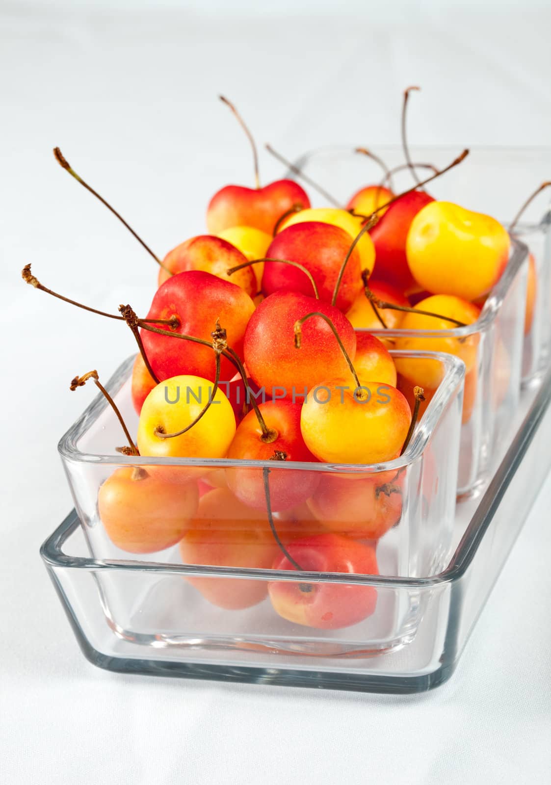 Delicious and colorful fresh rainier cherries in a bowl