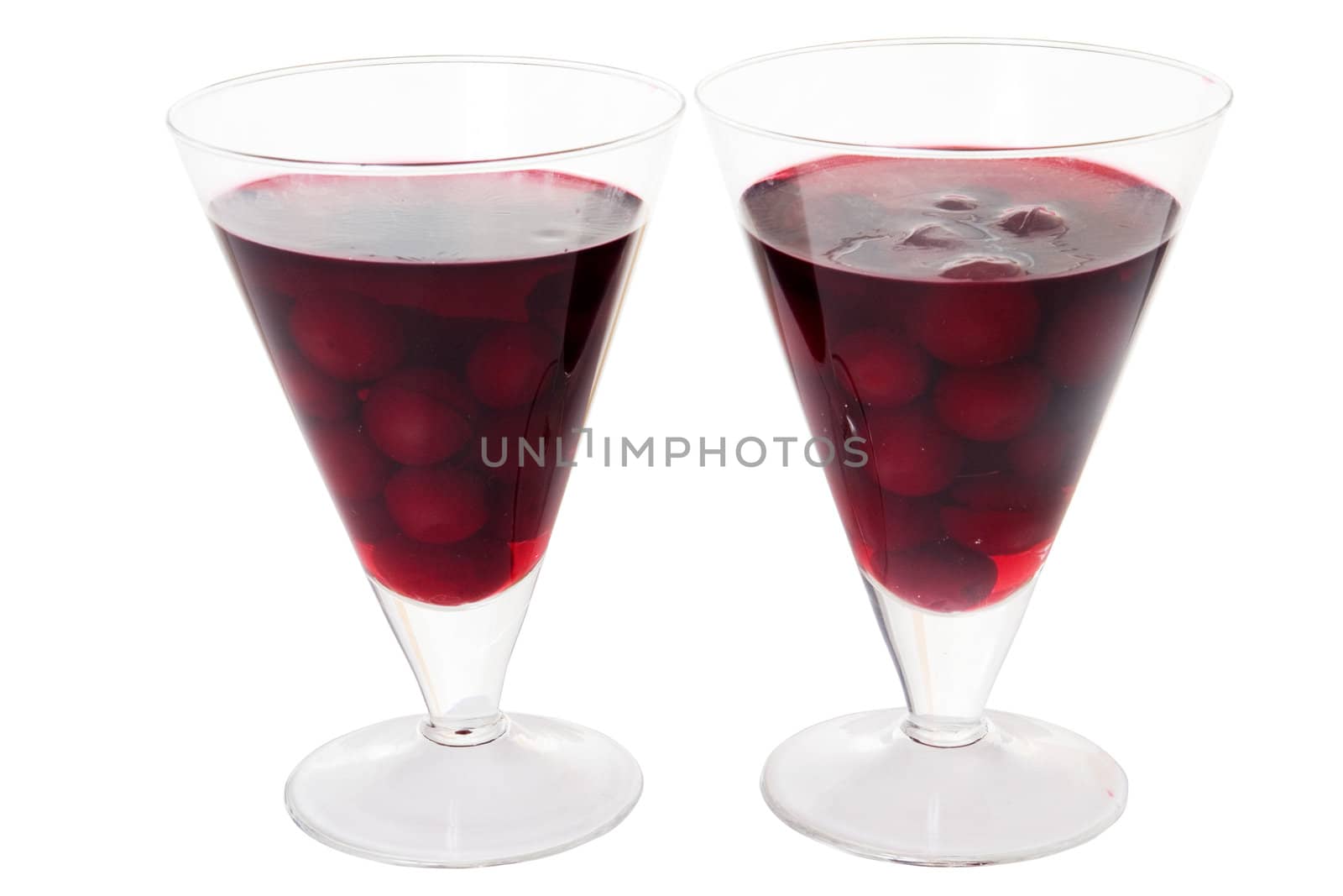 cerise dessert in glass isolated on white background