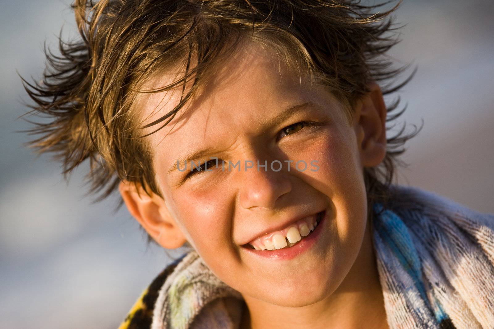 people series: portrait of smiling boy with wet hair