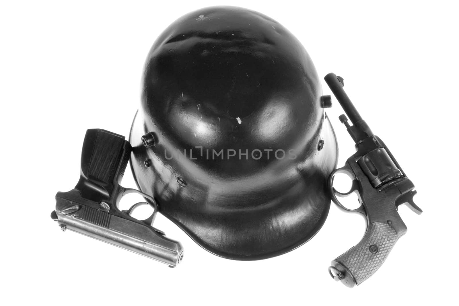  pistols and helmet isolated on white background