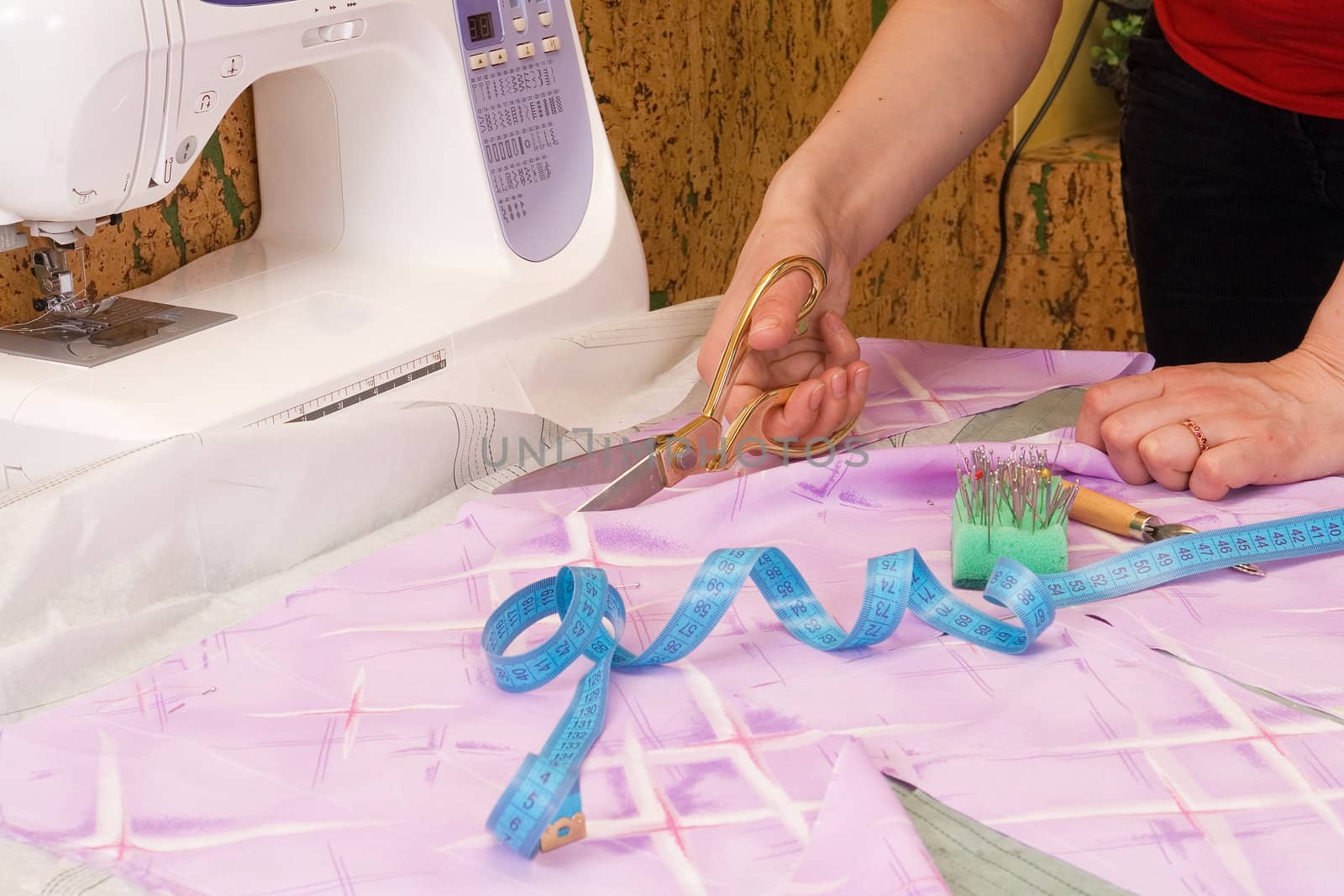 dressmaker cuts scissors fabrics