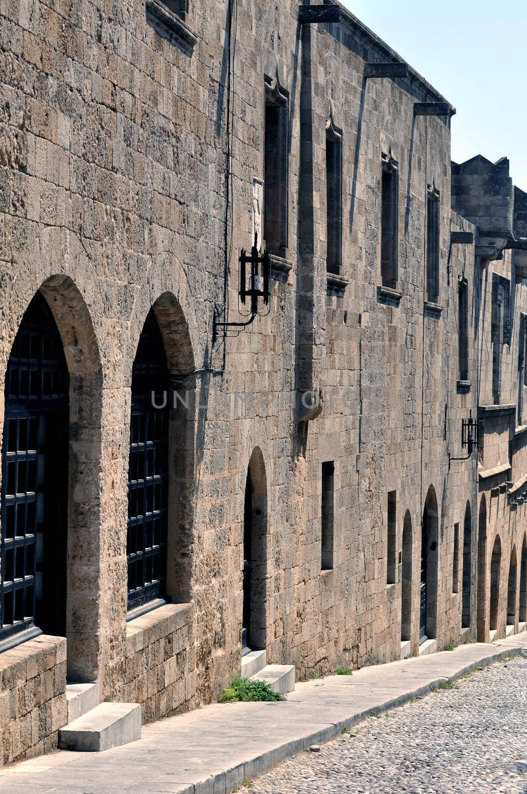 Travel Europe: typical view of a street in the old town of Rhodes, Greece.