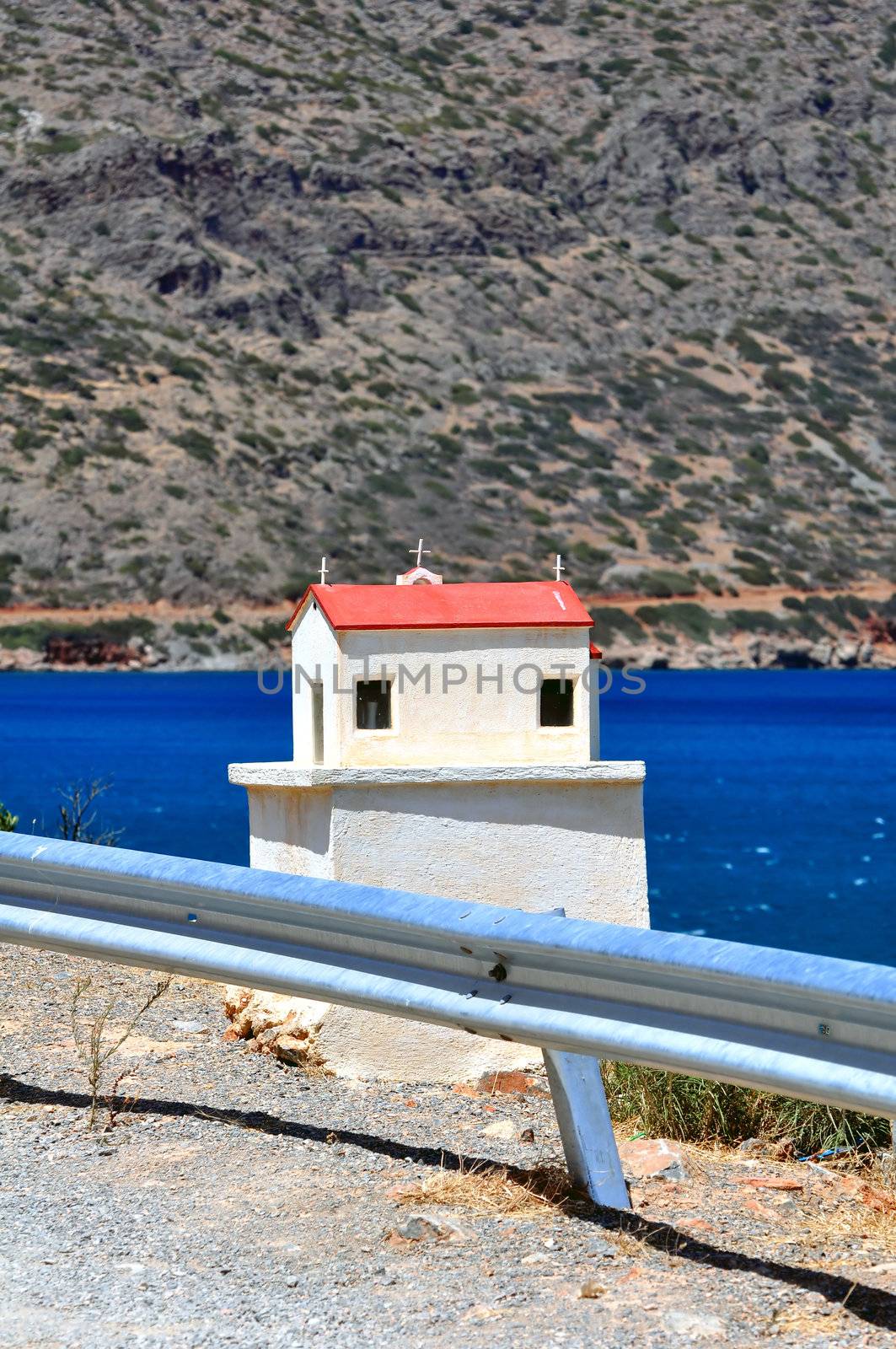 Greek tradition: Miniature Greek Ortodhox church, indicating a fatal road 

accident site.