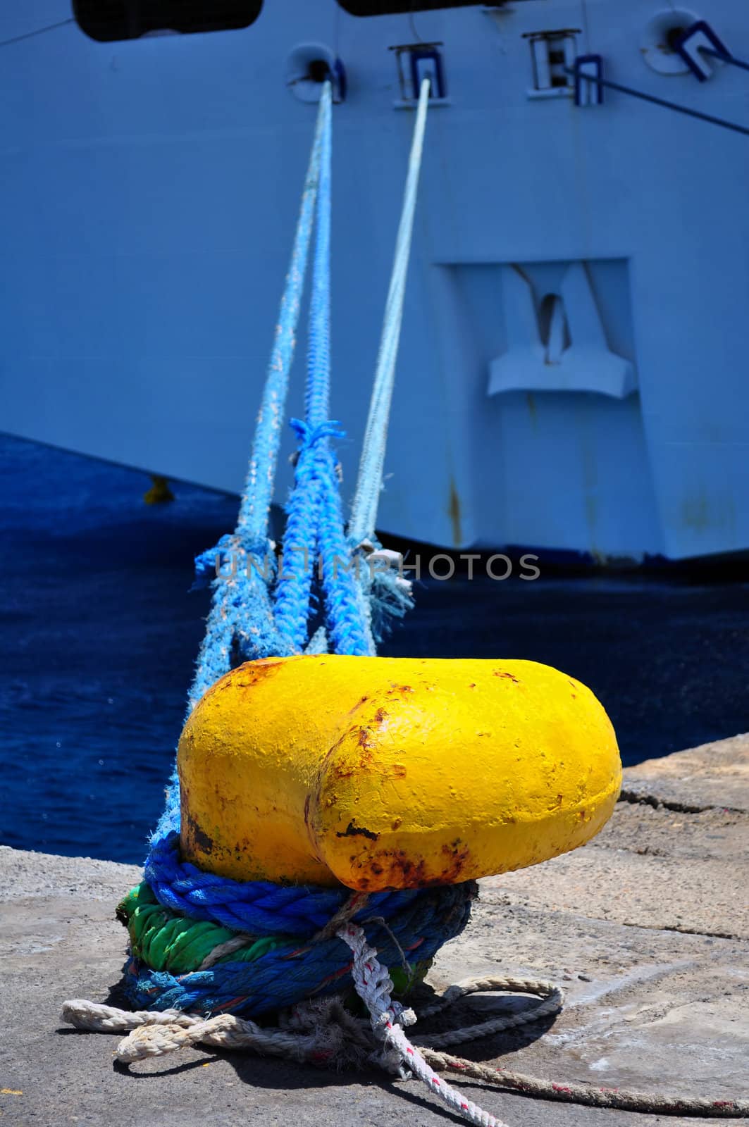 Ship tied to mooring cleat