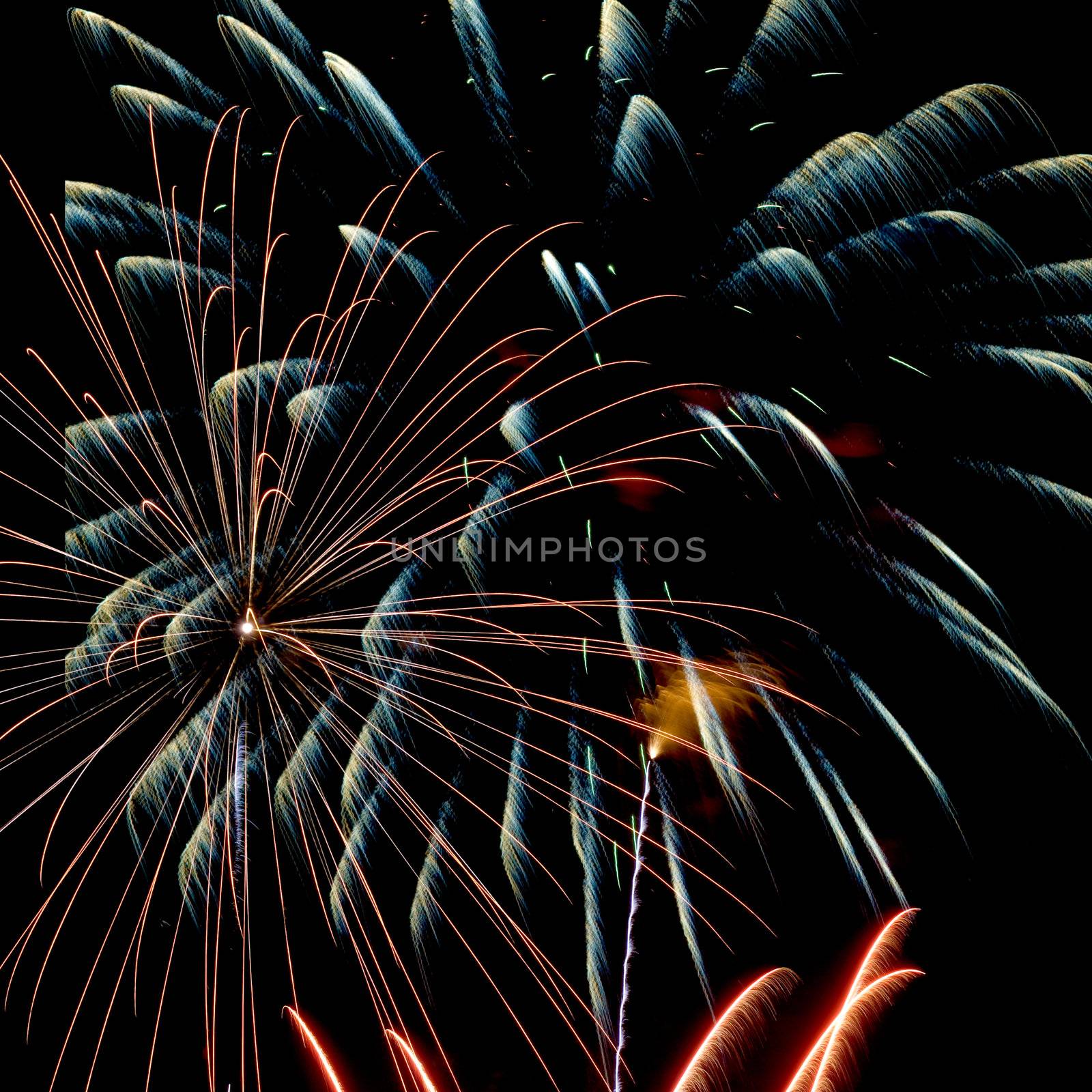 Firework streaks in the night sky during celebrations.