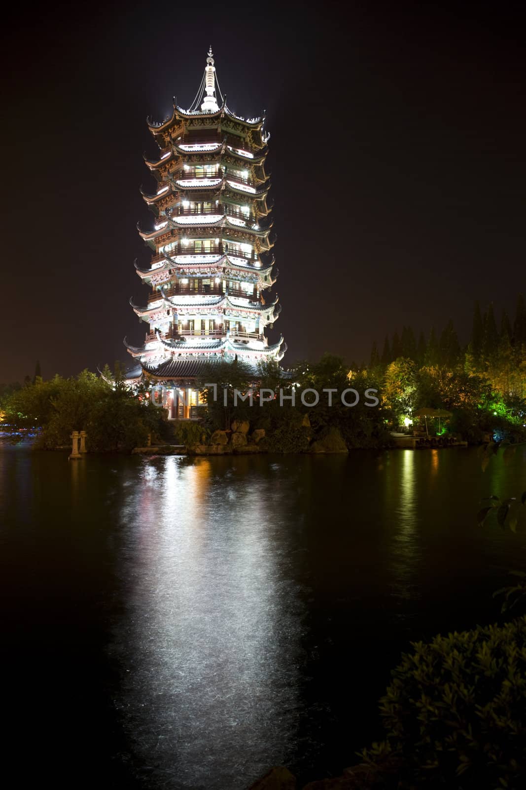 Night image of the Moon Pagoda at Guilin, China. This pagoda is one of the two pagodas located side by side which together are known as the Sun and Moon Pagodas of Guilin.