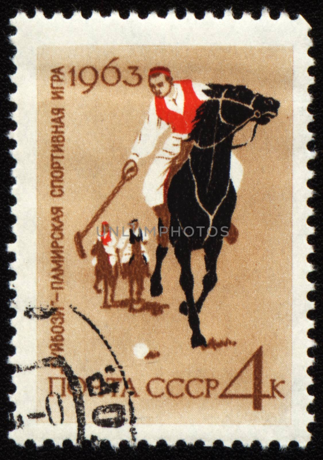 USSR - CIRCA 1963: A stamp printed in USSR shows Pamir horse folk game Guybozi, circa 1963