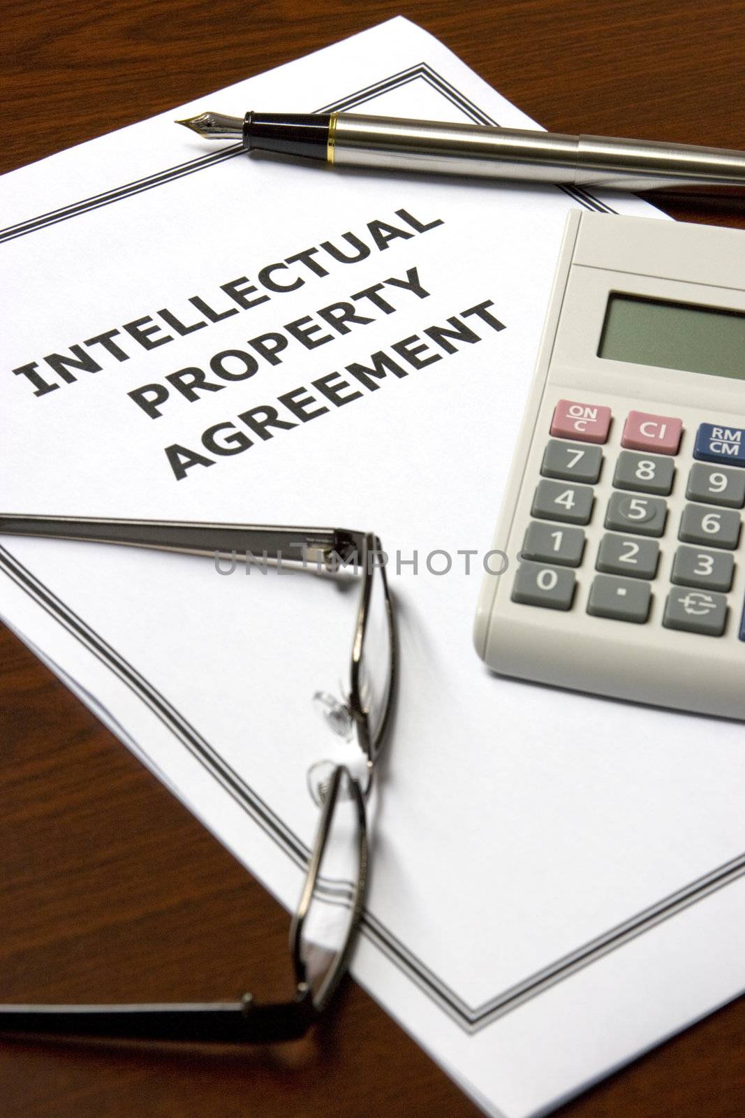 Image of an intellectual property agreement on an office table.