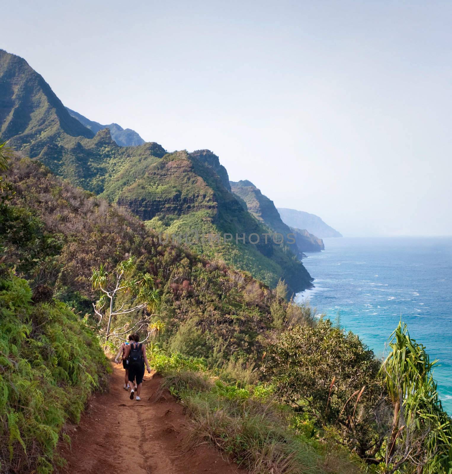 Female Hikers on Kalalau Trail Kauai by steheap