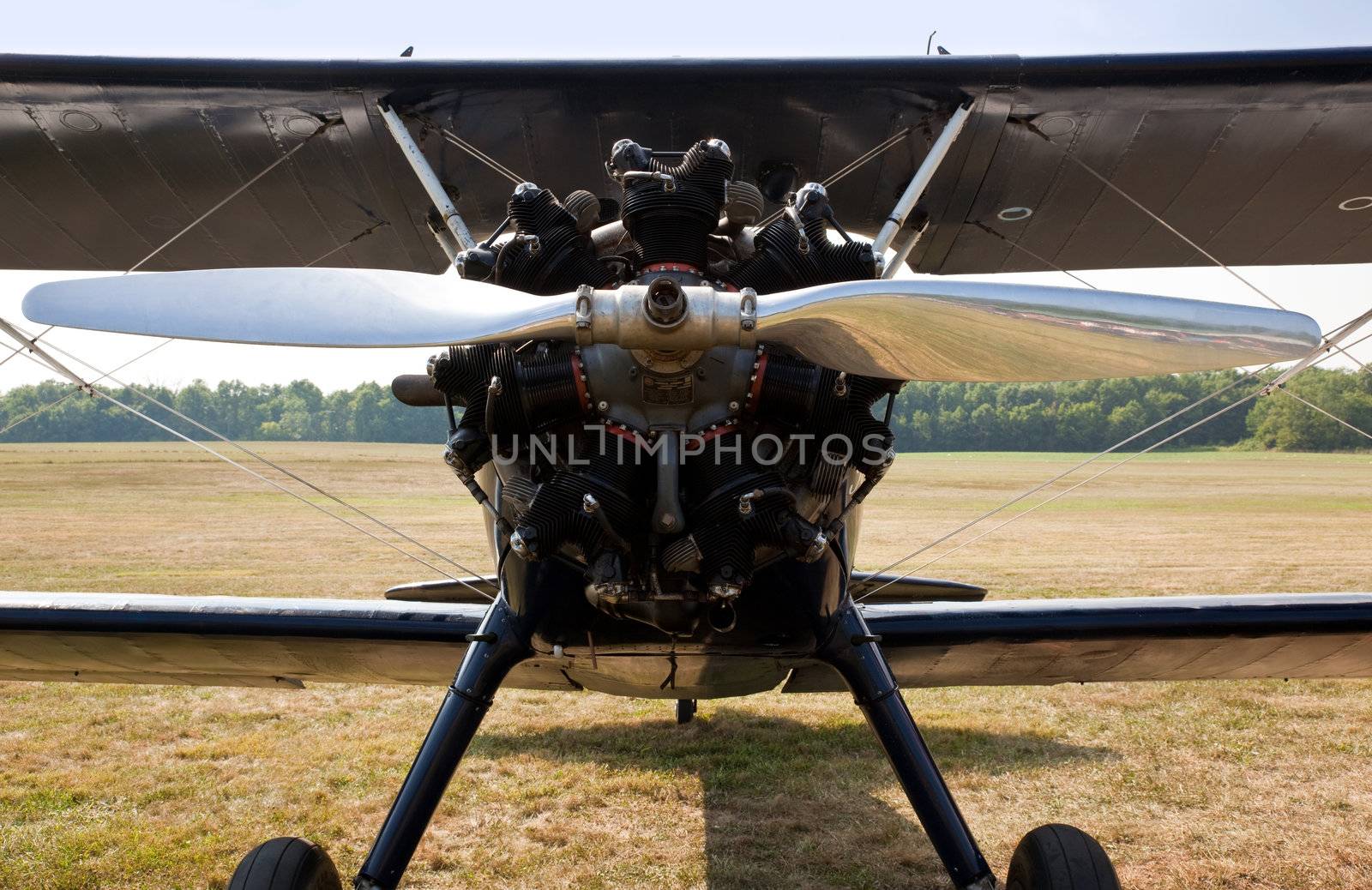 Close up of the engine and propellor of antique biplane