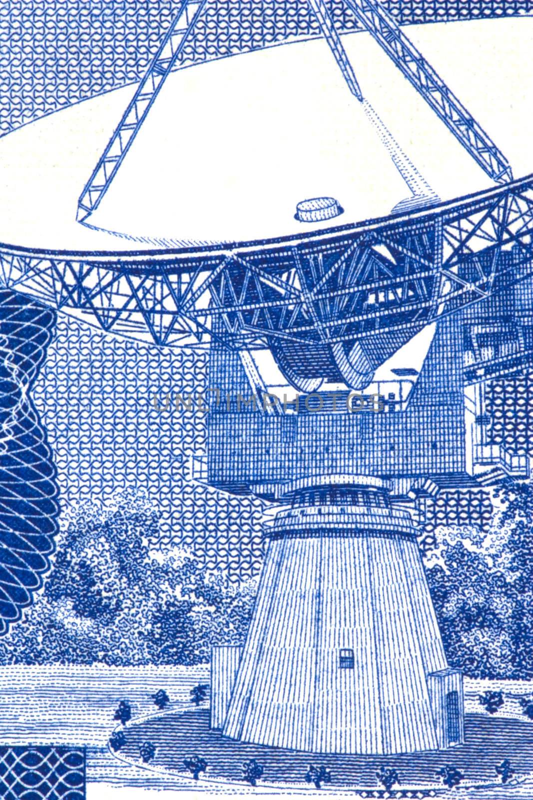 Macro image of a satellite dish on a currency note.