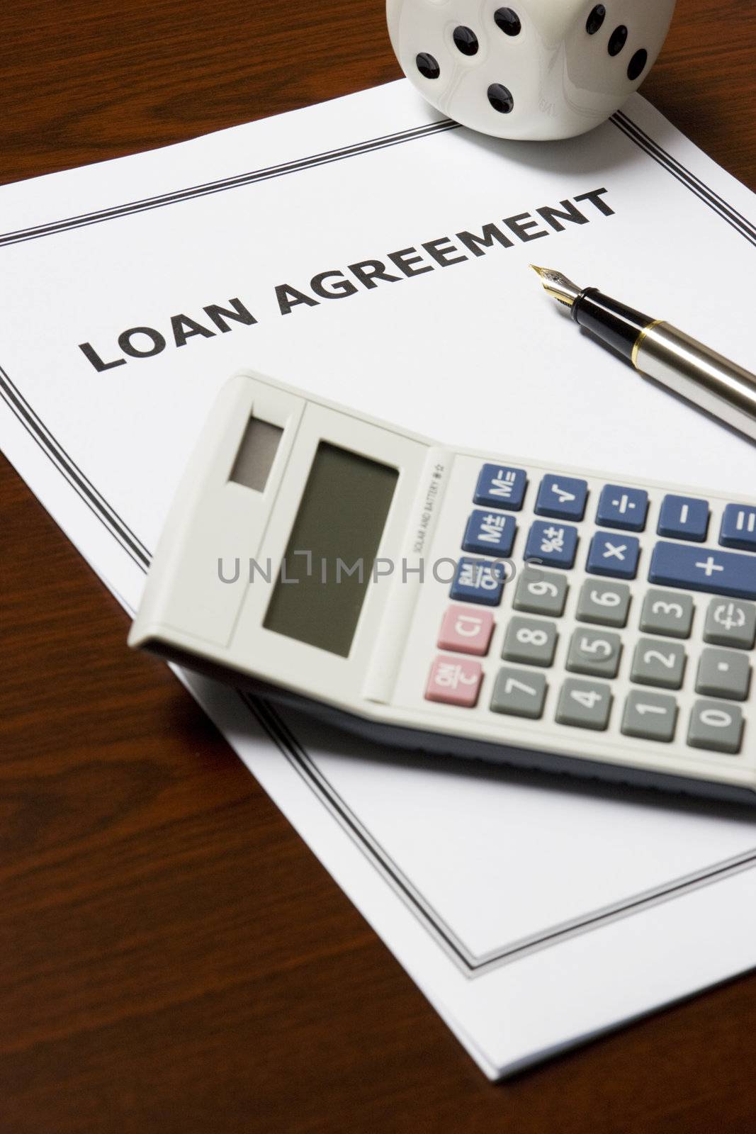 Image of a loan agreement on an office table.