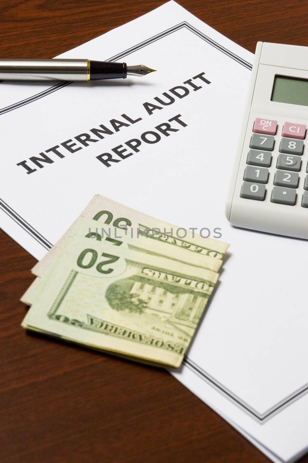 Image of an internal audit report on an office table.