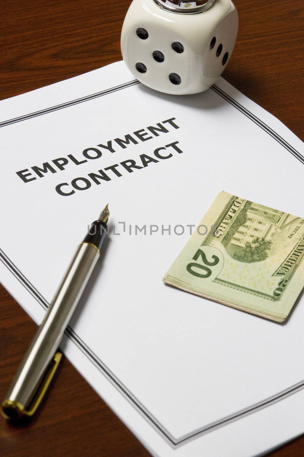 Image of an employment contract on an office table.