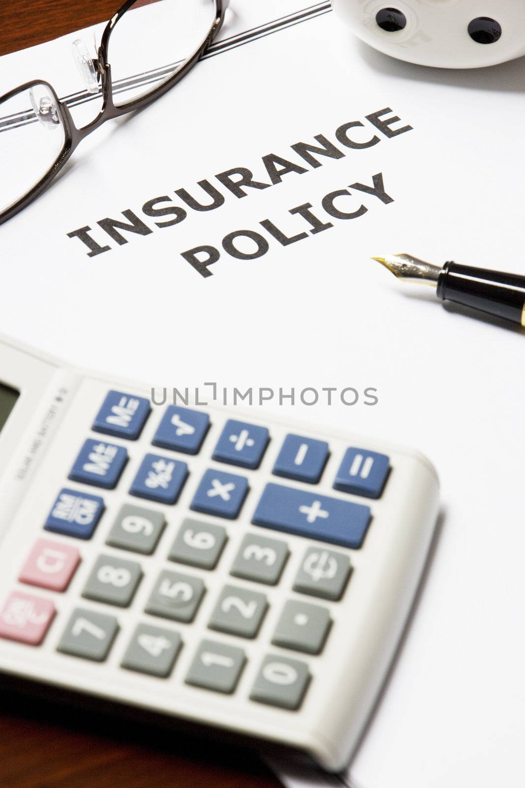 Image of an insurance policy on an office table.