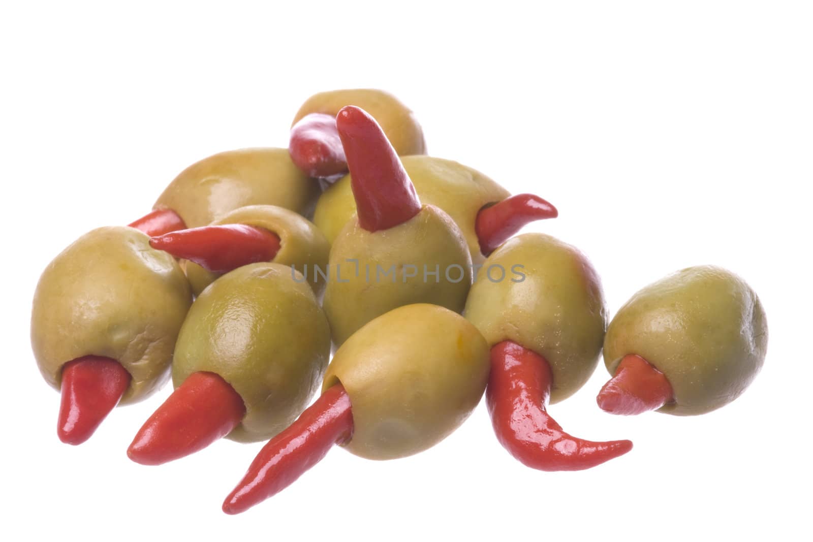 Isolated macro image of pickled pepper olives.