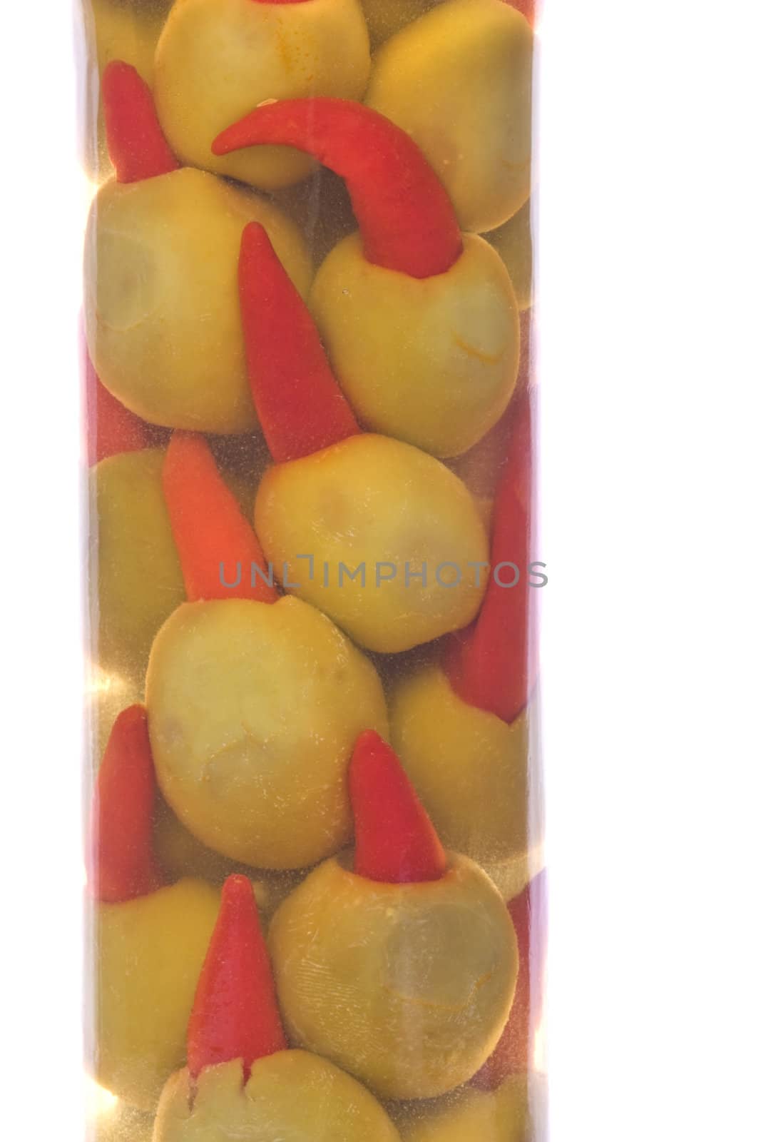 Pickled Pepper Olives in a Bottle Isolated by shariffc
