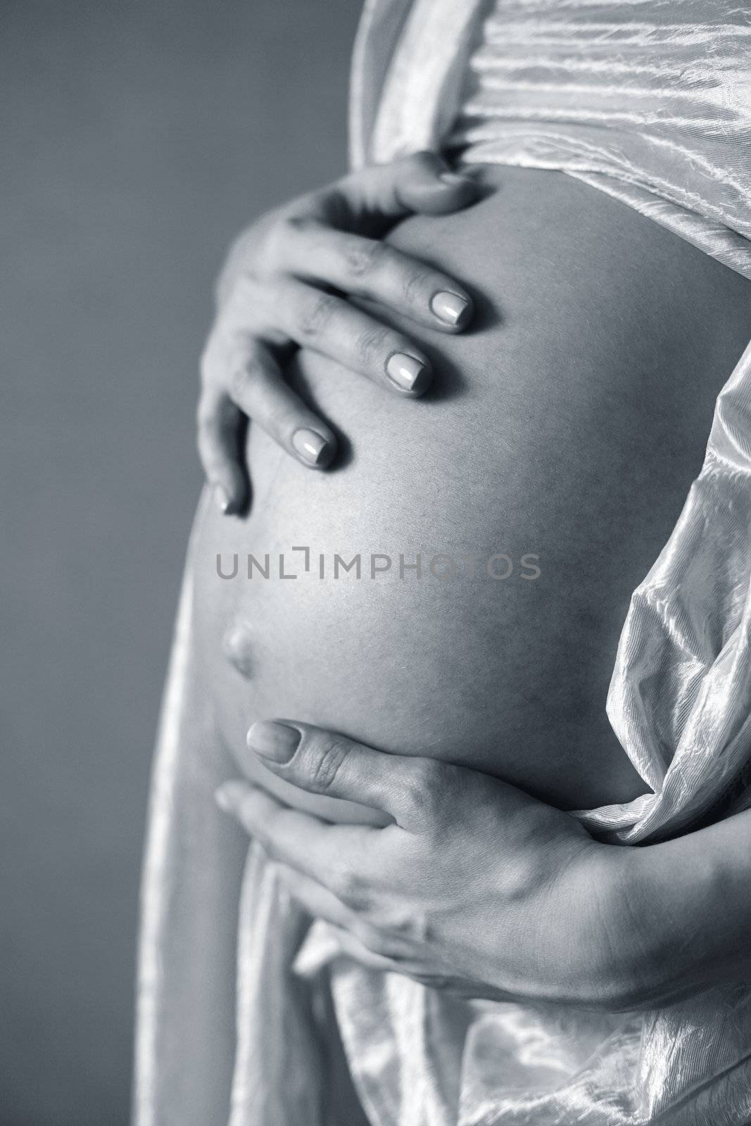 The pregnant woman on the ninth month. At once next day after shooting the remarkable boy was born