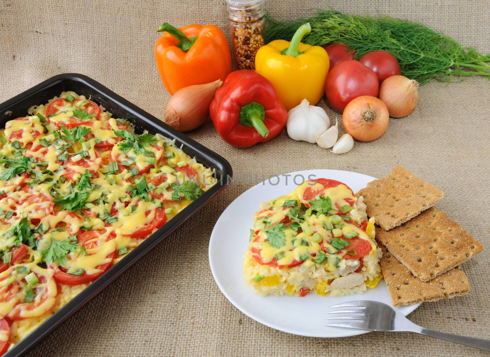 Rice casserole with vegetables Chicken fillet with tomato and ch by Apolonia