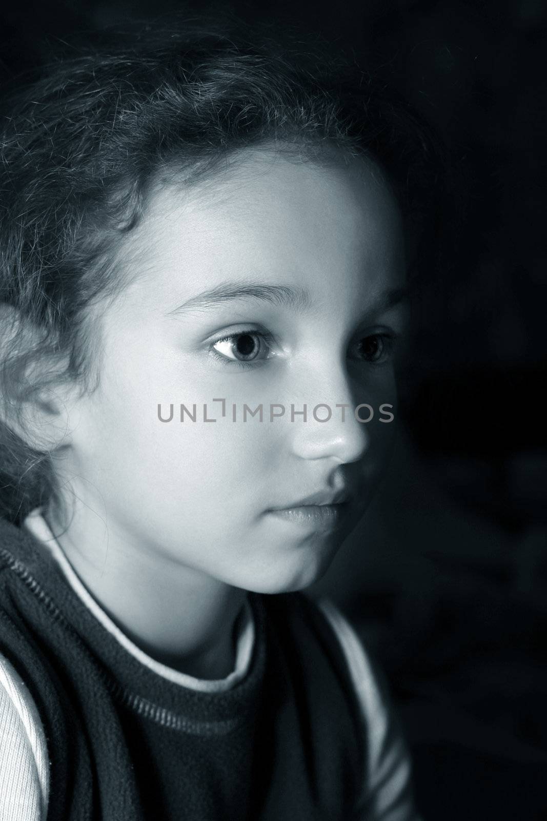 Portrait of the beautiful little girl. B/w + blue tone