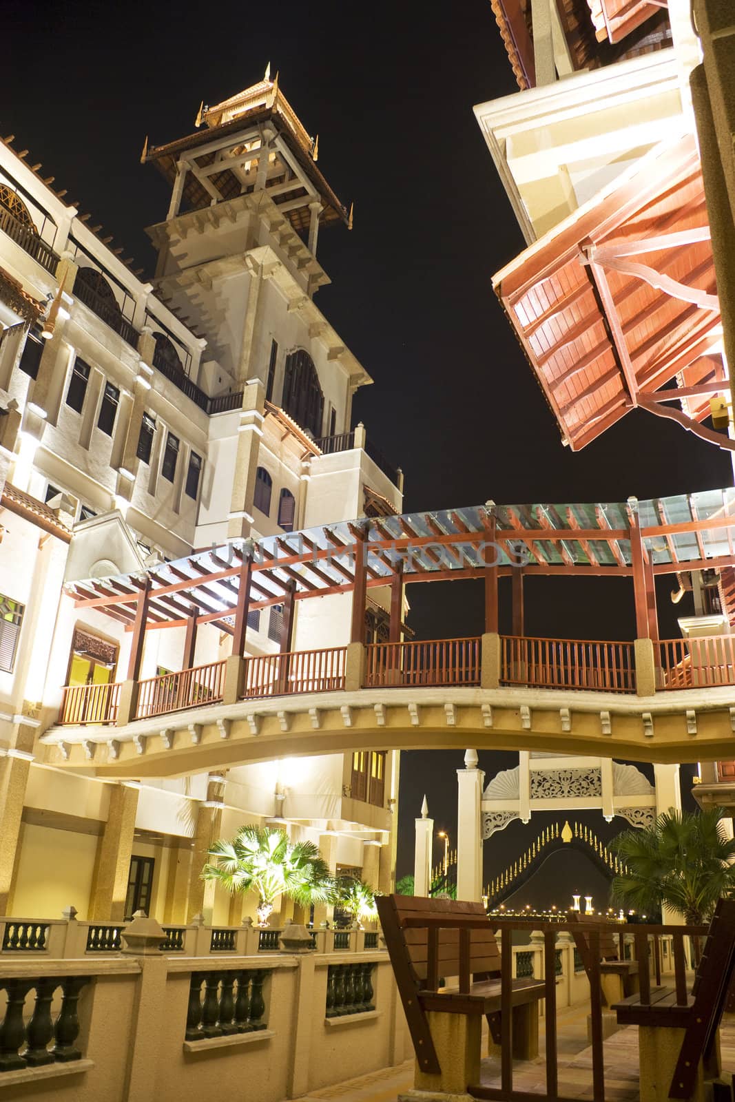 Night image of modern buidings with Malaysian traditional architectural influence.