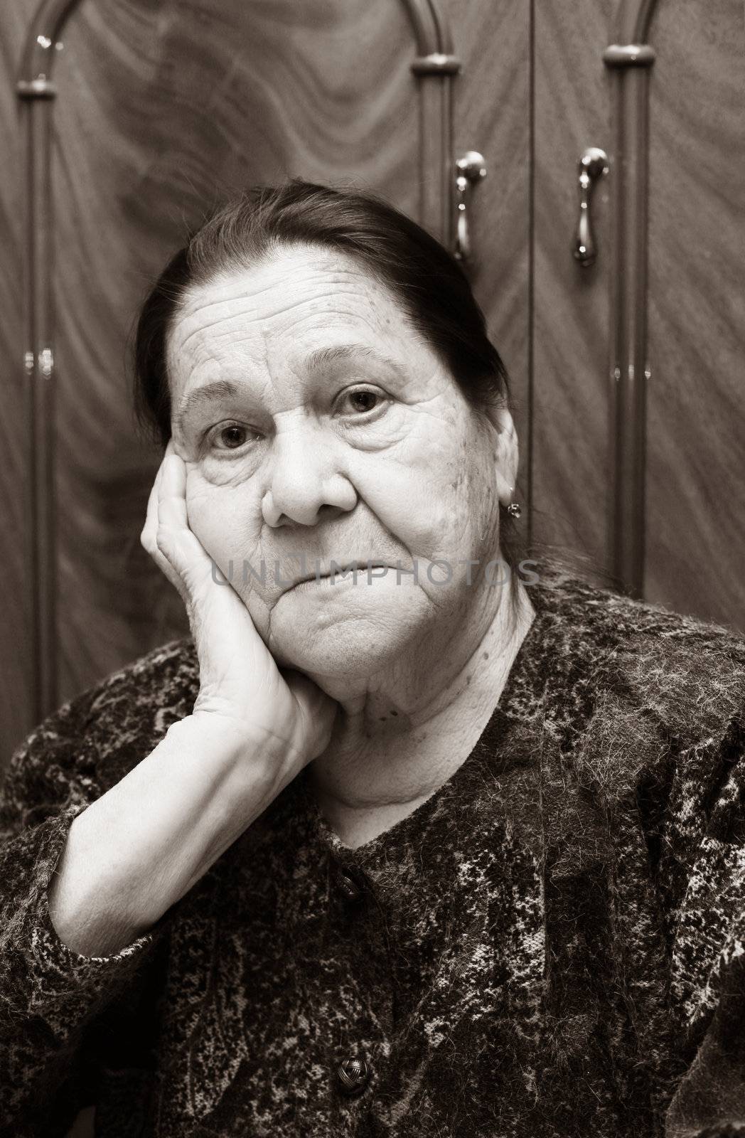 Sad grandmother close-up. Woman in her eighties.