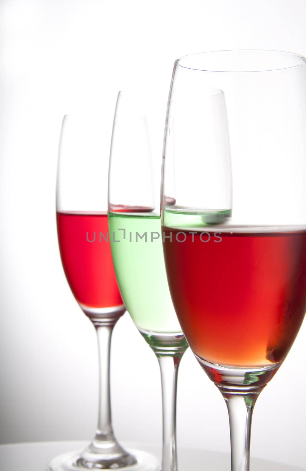 Three colorful cocktails in red and green for a party