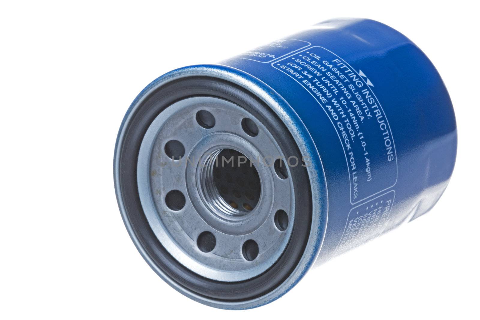 Isolated image of an engine oil filter.