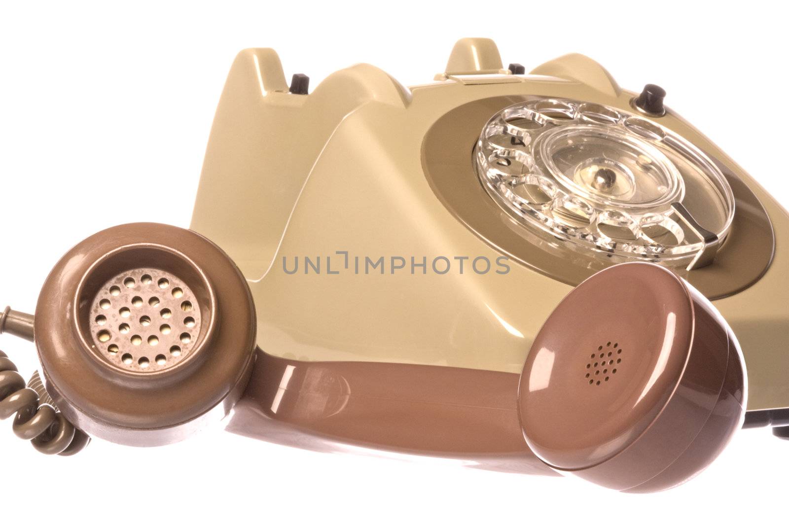 Isolated image of a vintage telephone.