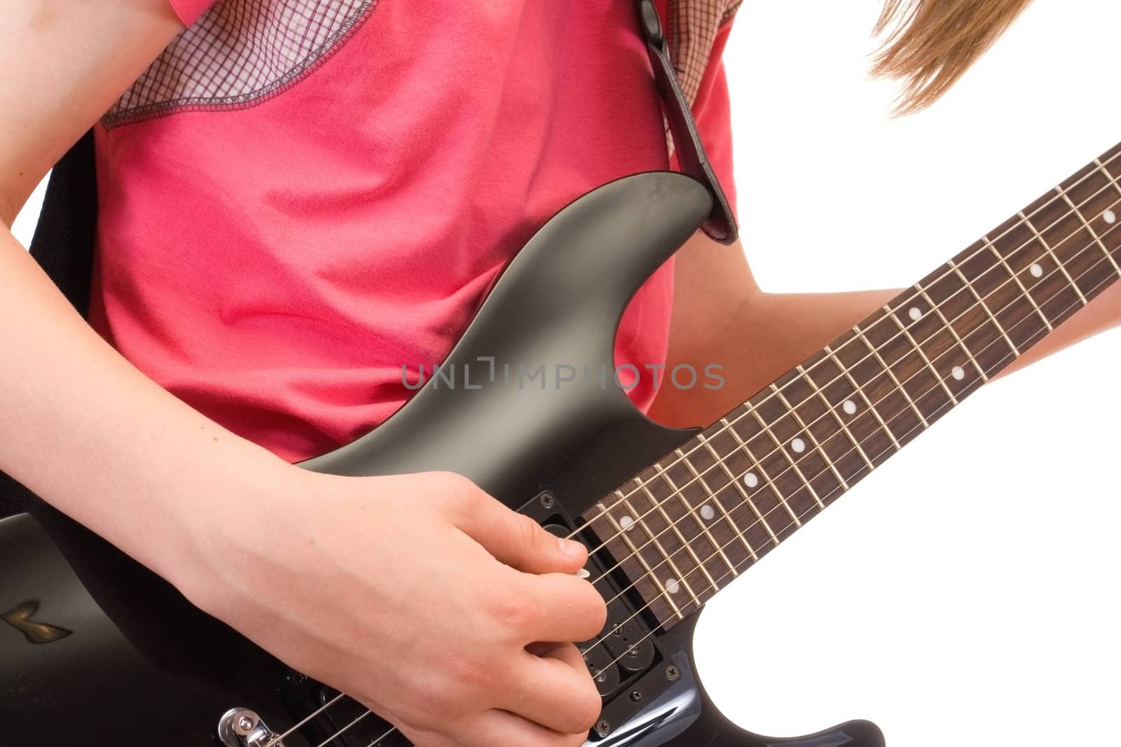 teenager musician plays on guitar