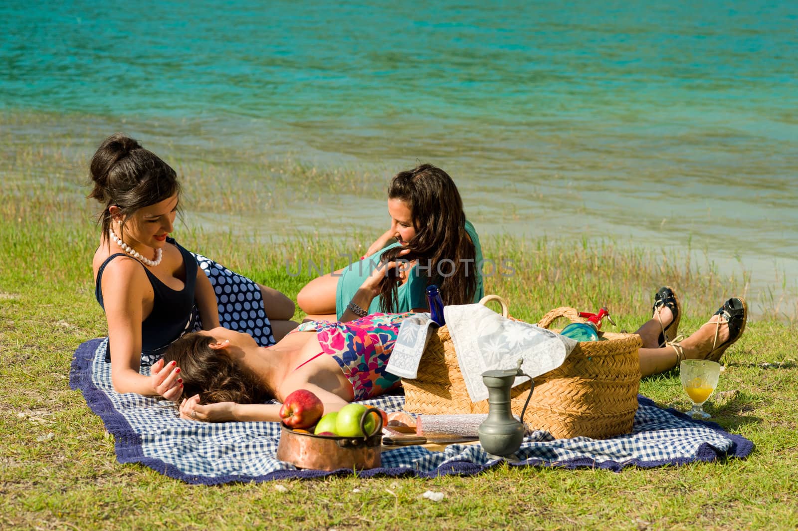 Girls resting after an ejoyable picnic outdoors