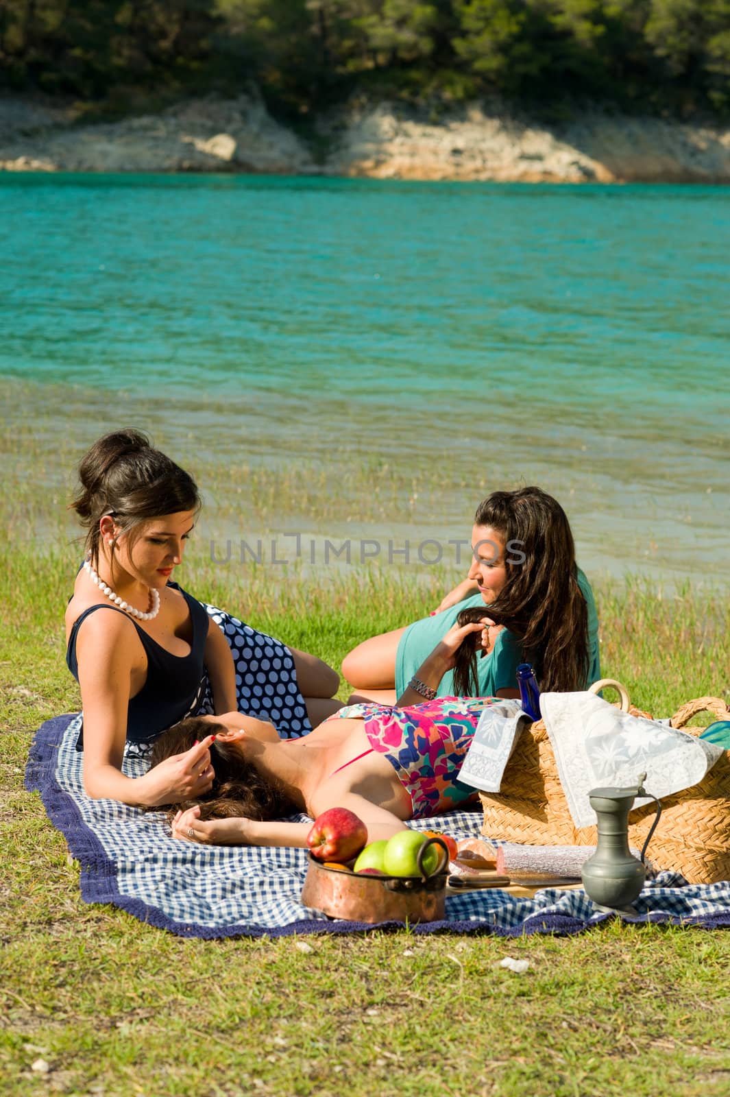 Girls resting after an ejoyable picnic outdoors