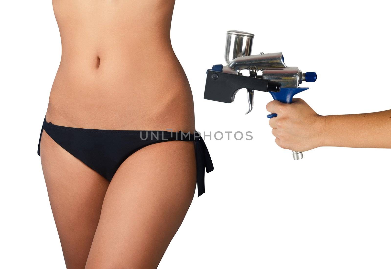 perfect woman body closeup and hand with tanning gun for quick tanning on a white background