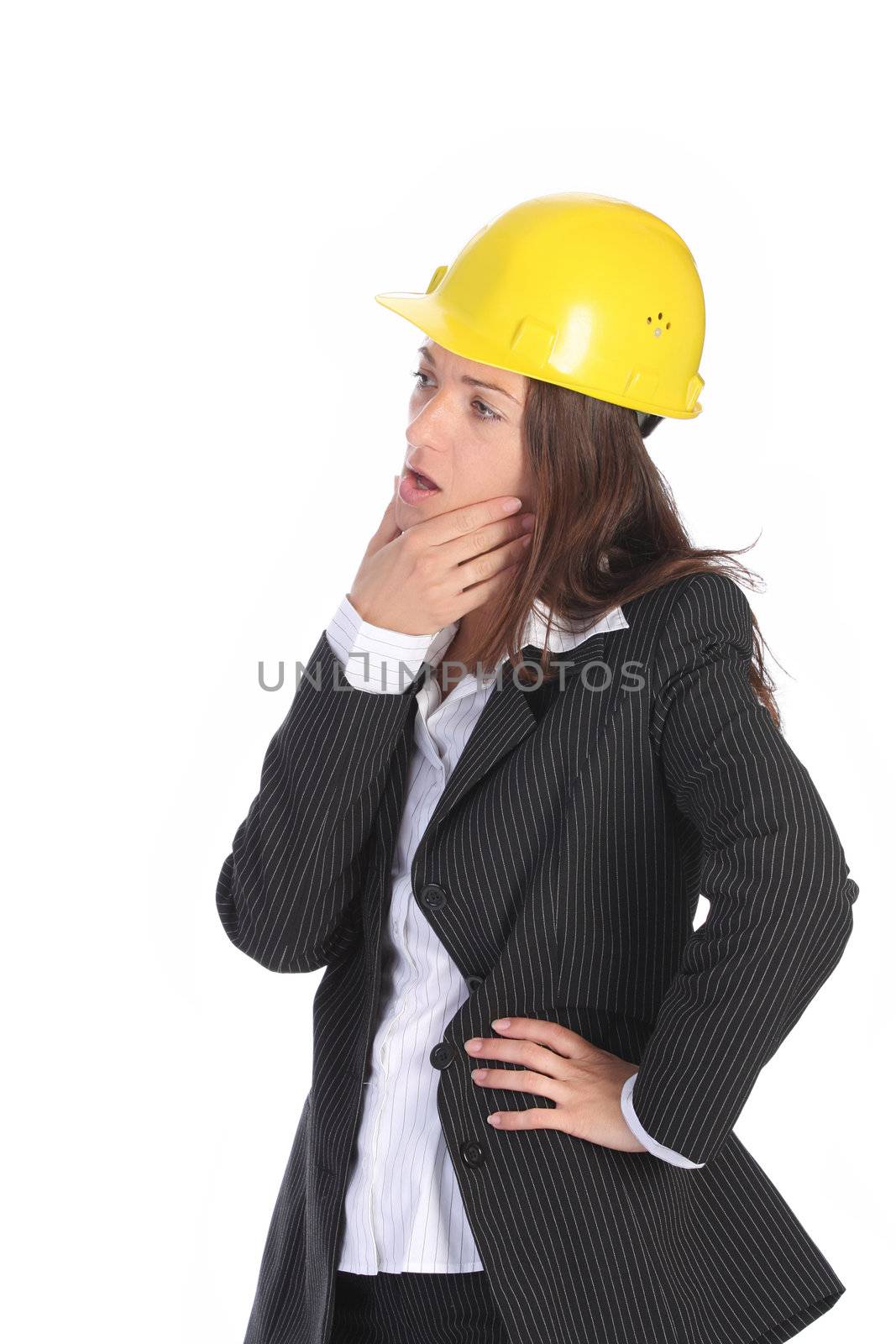 young businesswoman thinking with helmet on white background