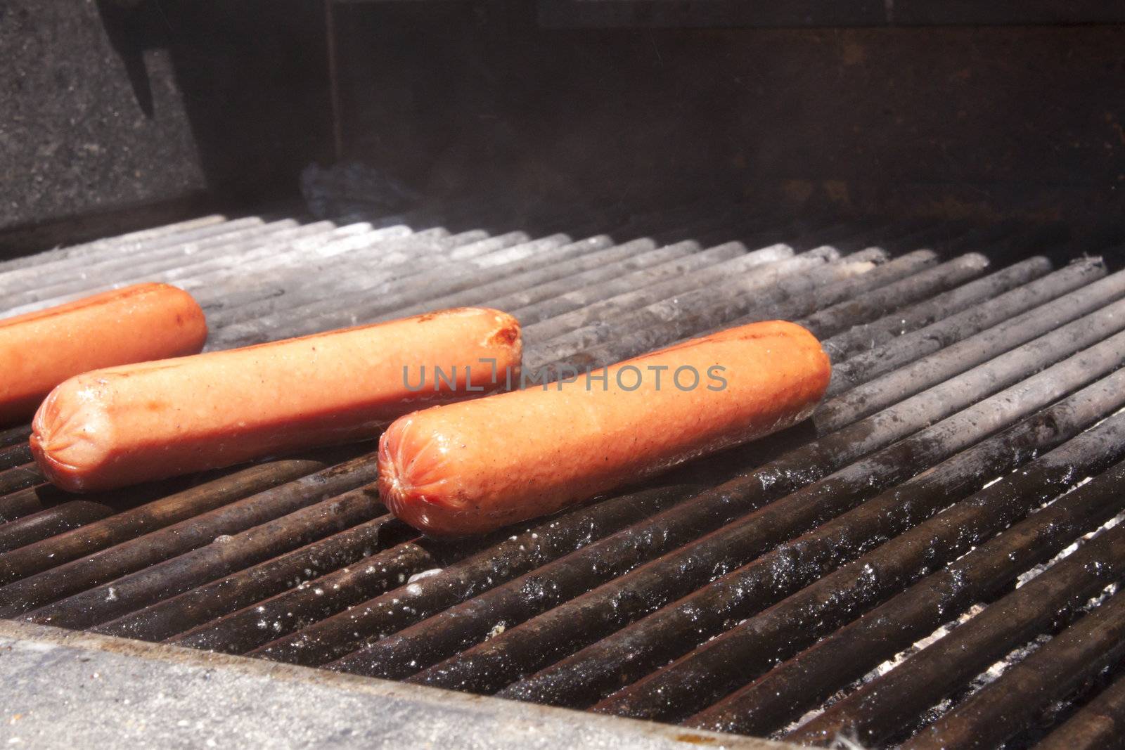 Hot dogs on a bbq by jeremywhat