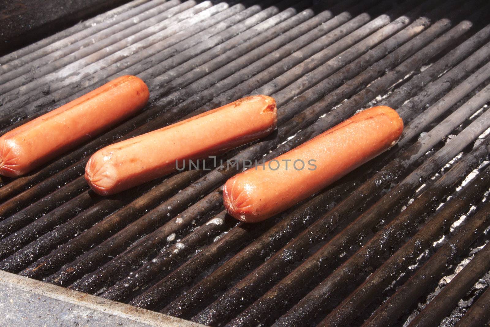 Hot dogs on a bbq