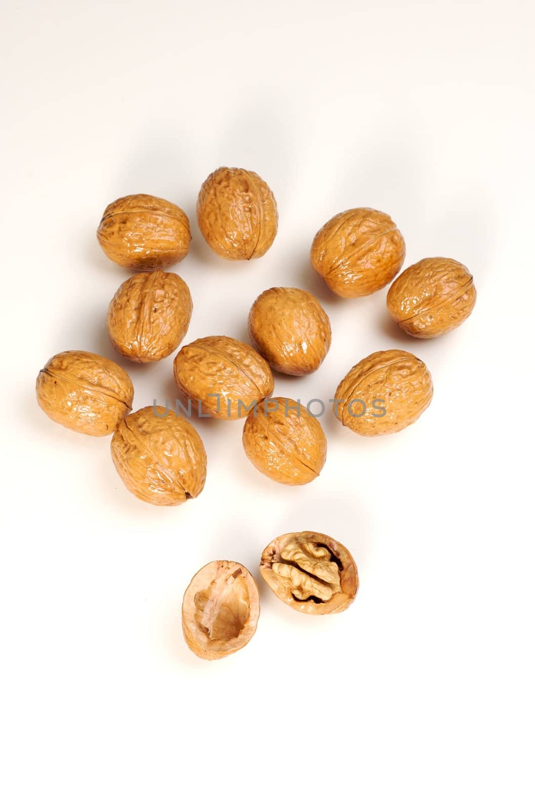 Walnuts isolated on white, one cracked