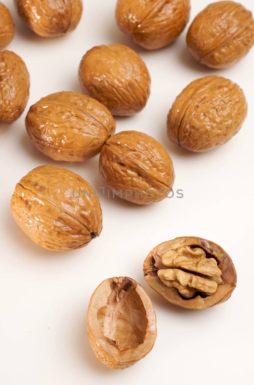 Walnuts isolated on white, one cracked