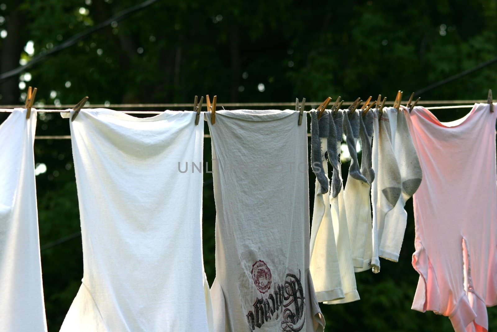 Clothes hanging outside to dry in the sun
