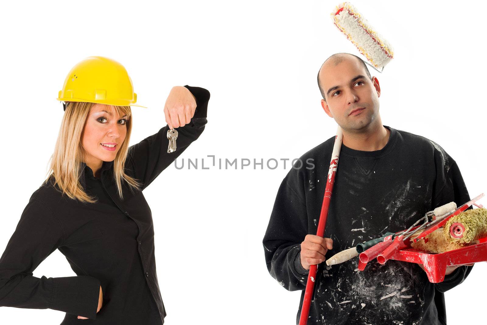businesswoman with keys and house painter with paint roller
