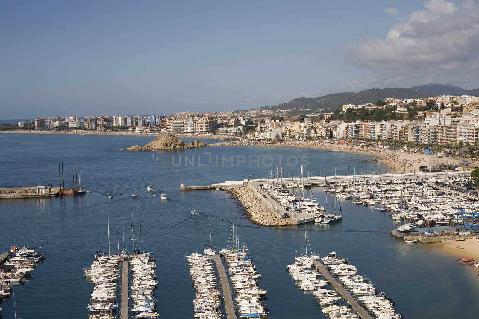 Panoramic view of Blanes city, sailing port, and beaches, at the Spanish Costa Brava (Mediterranean sea). 
