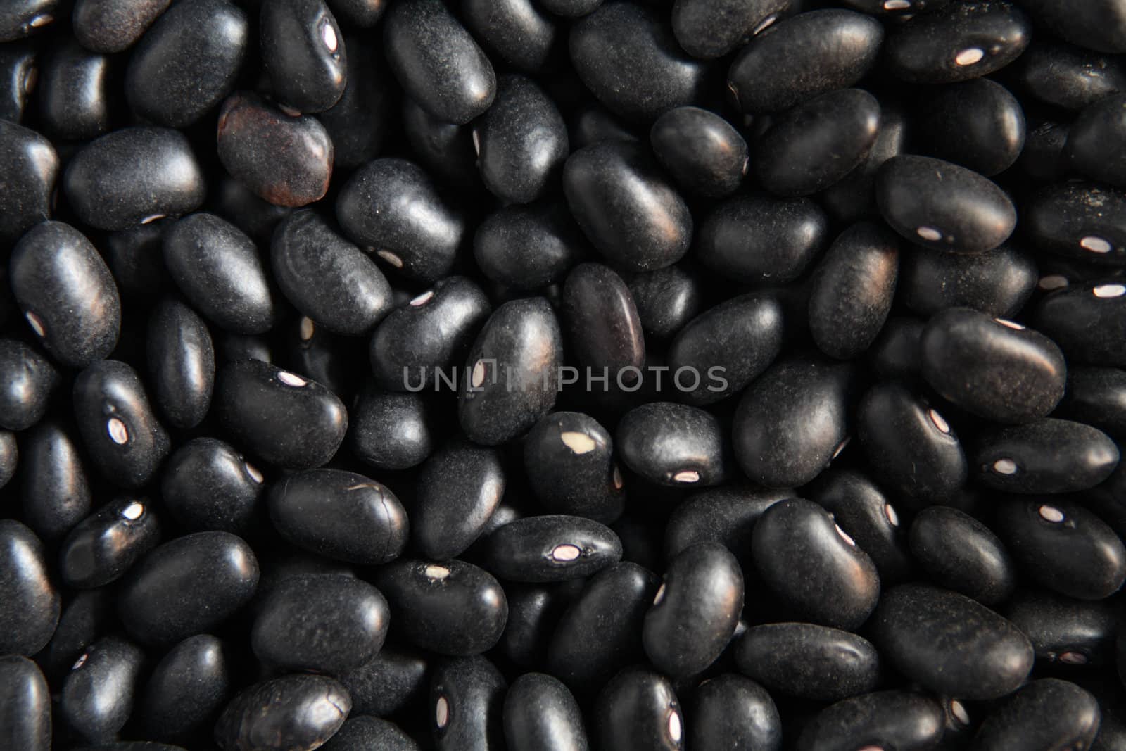 A background photo of black beans texture