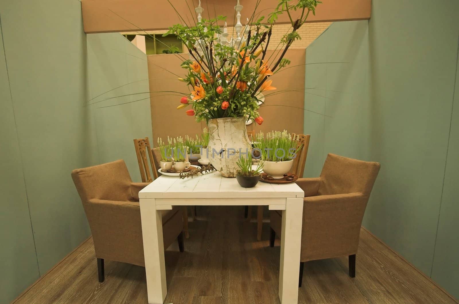 Modern dining room arranged with flowers in various colors