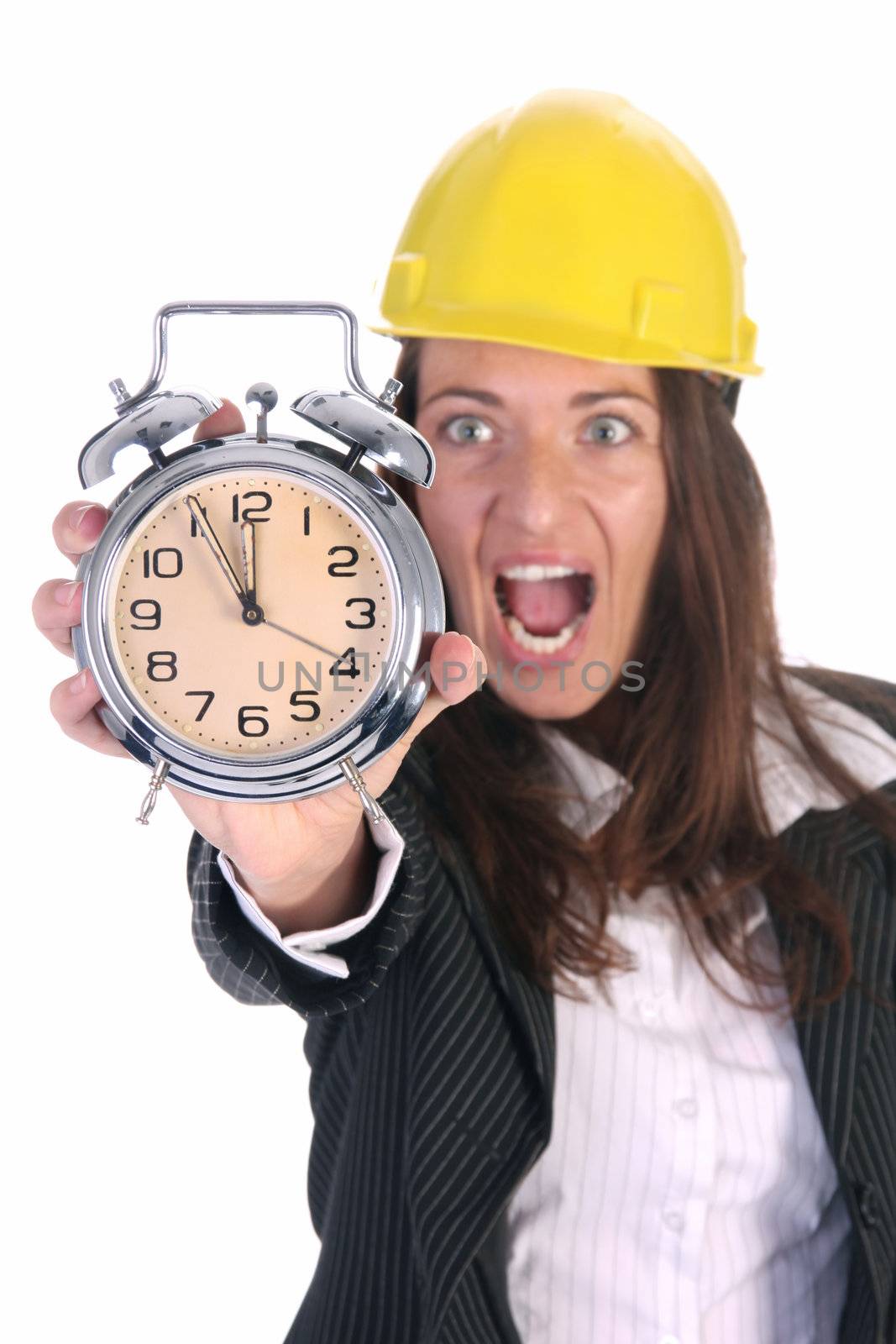 young businesswoman confused looking at clock alarm